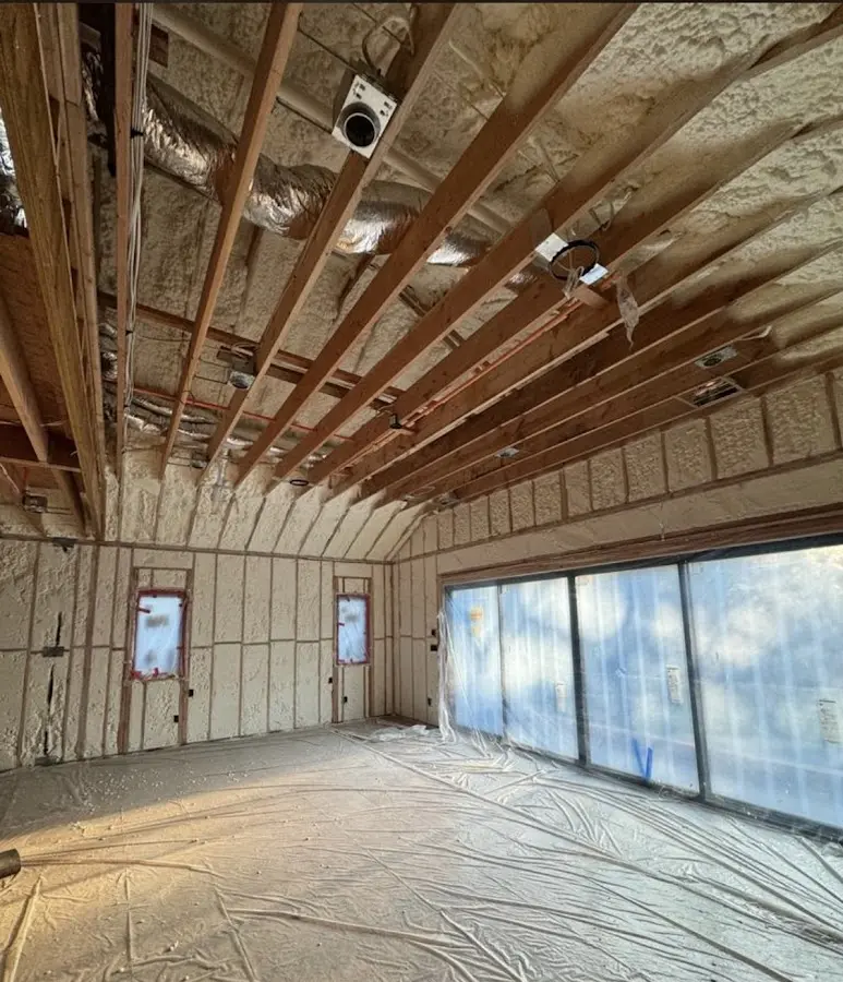 Interior walls and ceiling insulated with spray foam during new construction in Marlborough